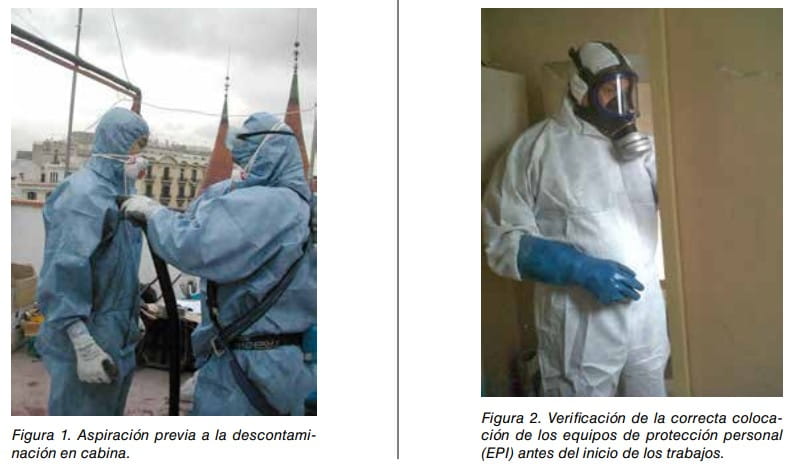 Trabajadores con trajes de protección durante la descontaminación en cabina y verificación de EPI antes de los trabajos.